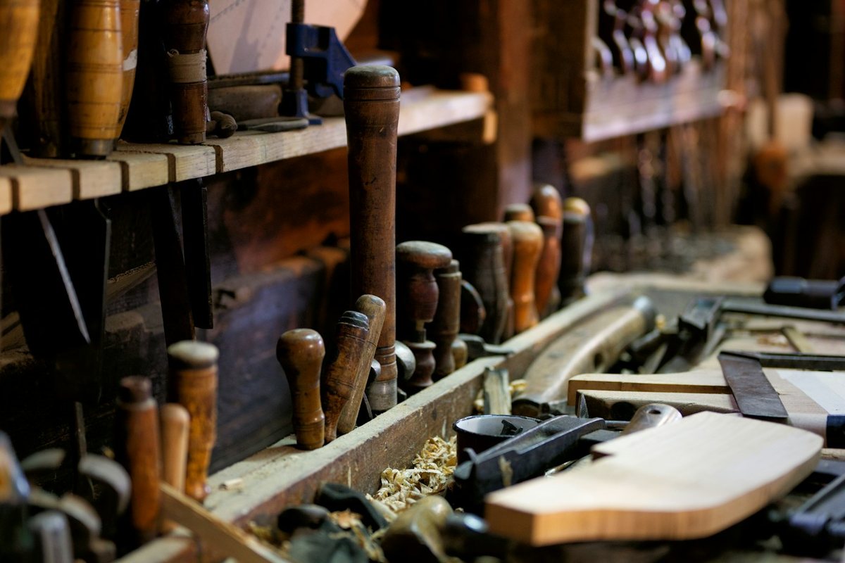 a workbench filled with lots of different types of tools